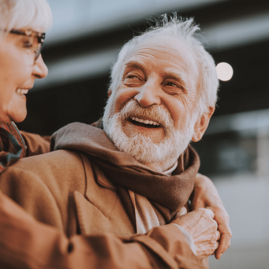 Senior couple bundled up and staying warm in the cold weather